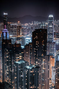 Illuminated buildings in city at night