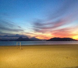 Scenic view of sea at sunset
