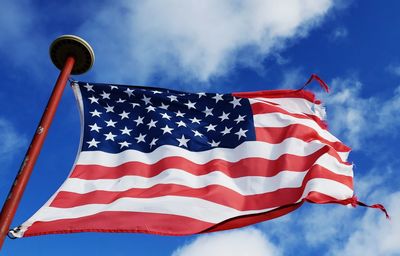 United states  flag tattered in the wind