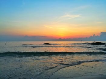 Scenic view of sea against sky during sunset