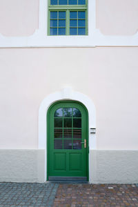 House exterior with the green door