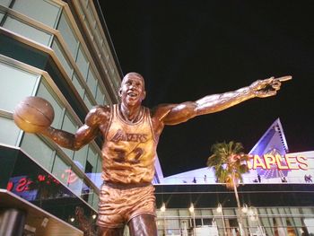 Low angle view of man with arms raised