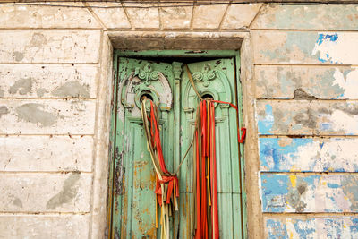 Low angle view of closed door of building