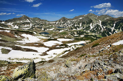 Scenic view of mountains against sky during winter