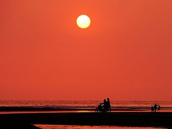 Scenic view of sea at sunset