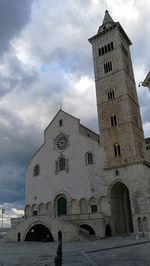 View of clock tower against cloudy sky