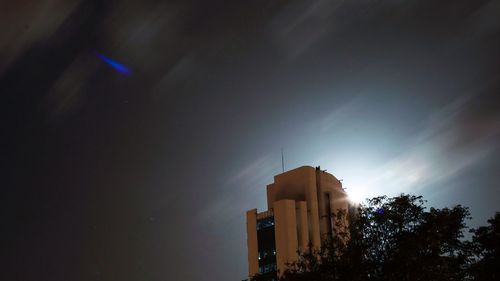 Low angle view of building against sky at night