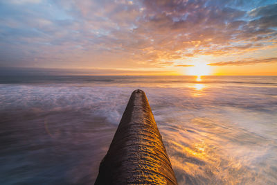 Scenic view of sea at sunset