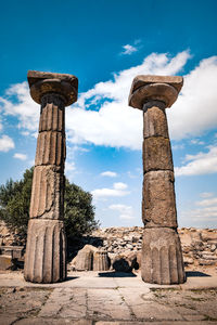 Low angle view of stone structure against sky