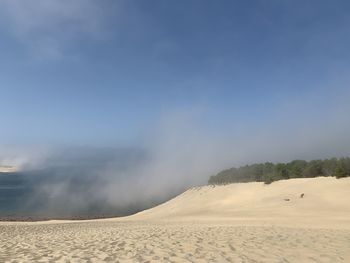 Scenic view of desert against sky