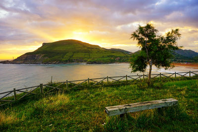 Scenic view of sea against sky during sunset