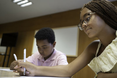 Young woman using laptop at home