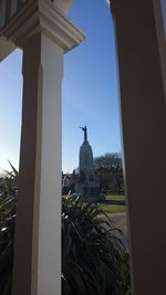 Statue of historic building against sky