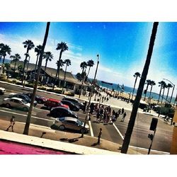 Street light against cloudy sky