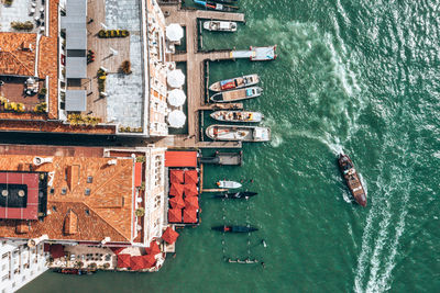 Top down view of moored empty venetian gondolas