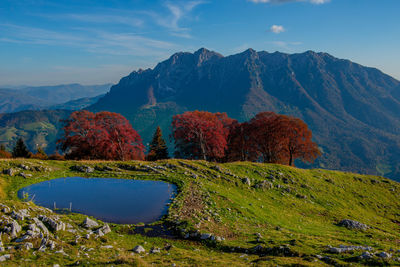 Scenic view of lake against mountain range