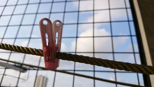 Low angle view of rope against sky