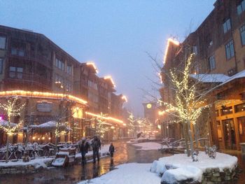 Snow covered city at night