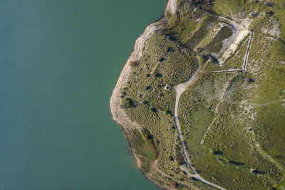 Aerial view of seascape by land