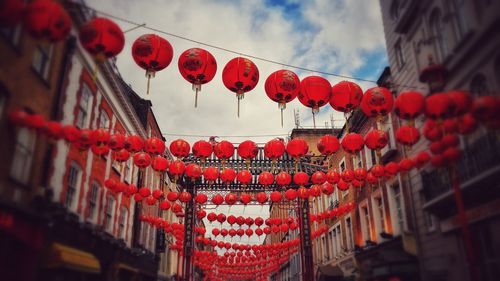 Red lanterns hanging against sky