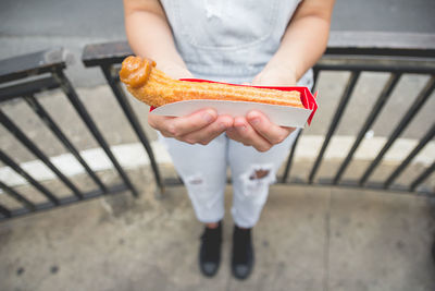 High angle view of man holding food