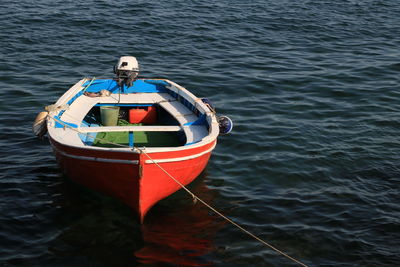 Rear view of man on boat sailing in sea