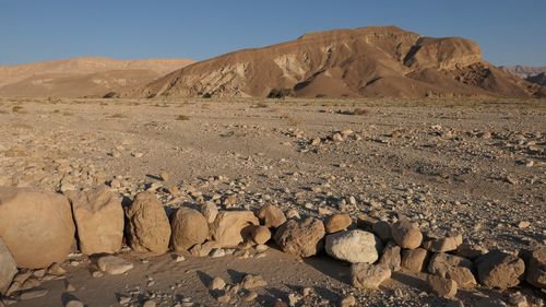 Scenic view of rocks in desert against sky