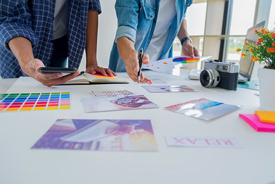 Group of people working on table