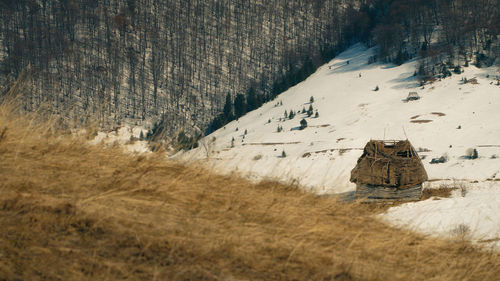 Scenic view of snow covered land