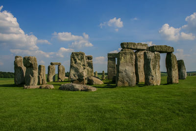 Built structure on landscape against sky