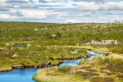 Meandering river and a mountain hut