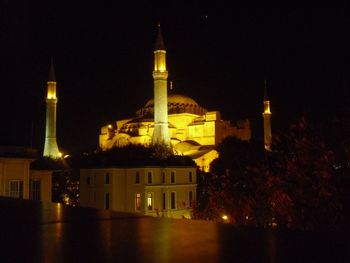 Illuminated temple at night