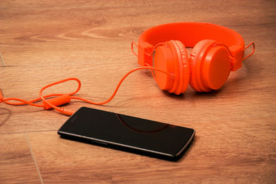 High angle view of smart phone on table
