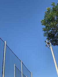 Low angle view of building against clear blue sky