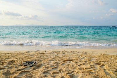 Scenic view of beach against sky