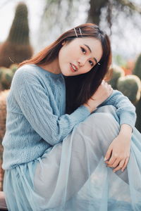 Portrait of a beautiful young woman in winter