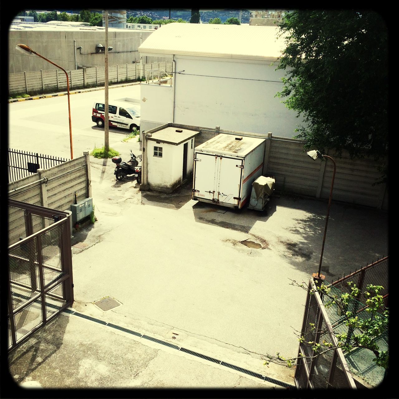 transfer print, building exterior, built structure, auto post production filter, architecture, power line, day, electricity pylon, power supply, tree, outdoors, sunlight, cable, house, plant, shadow, technology, electricity, low angle view