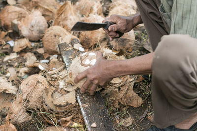 Man working on rock