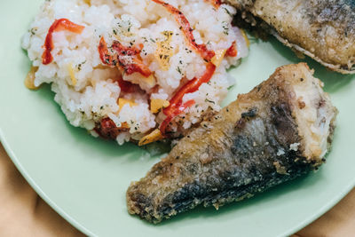 Sticky rice served with grilled fish