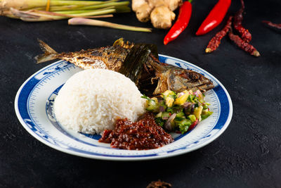 Close-up of food served on table