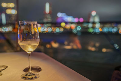 Close-up of wineglass on table