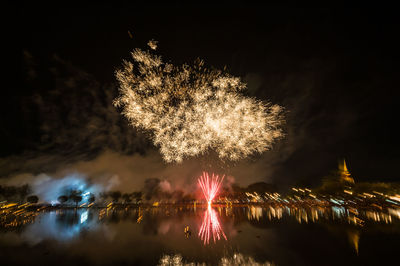 Firework display at night