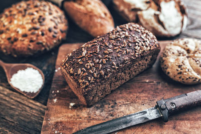 High angle view of bread on cutting board