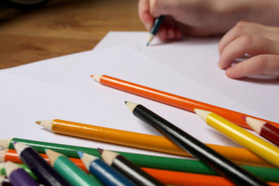 Close-up of smiley face on paper