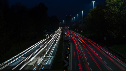 Light trails on road at night