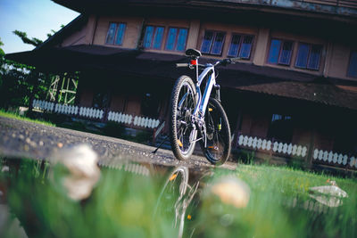 Bicycle parked outside building