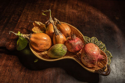 High angle view of fruits in bowl on table