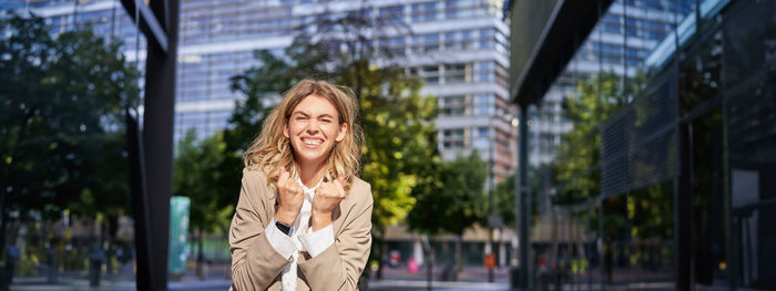 Young woman standing in city