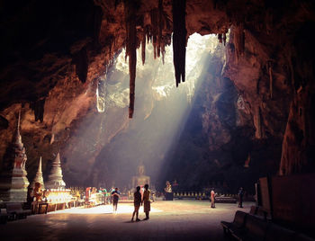 Group of people in cave