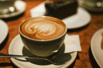 High angle view of cappuccino on table
